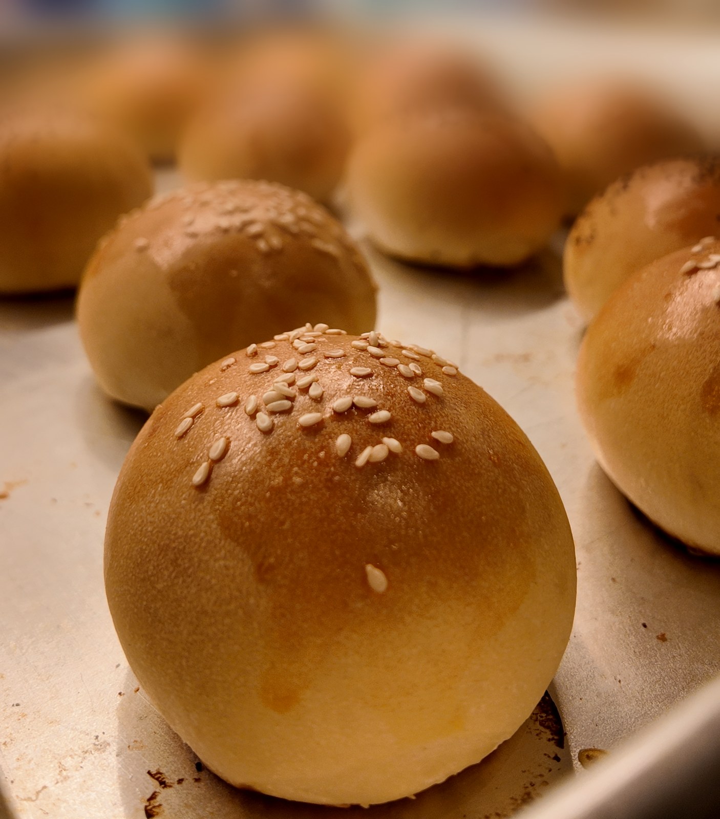 Freshly baked sesame rolls by Zagara Dining